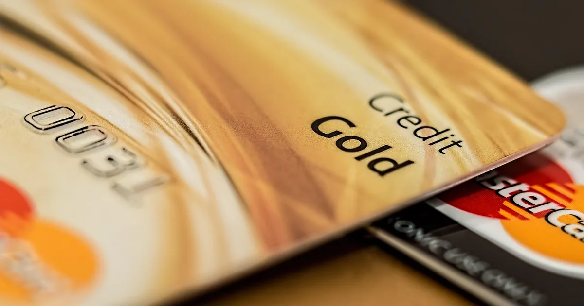 Credit Card vs Debit Card for Taxes: Rewards, Deductions, Records