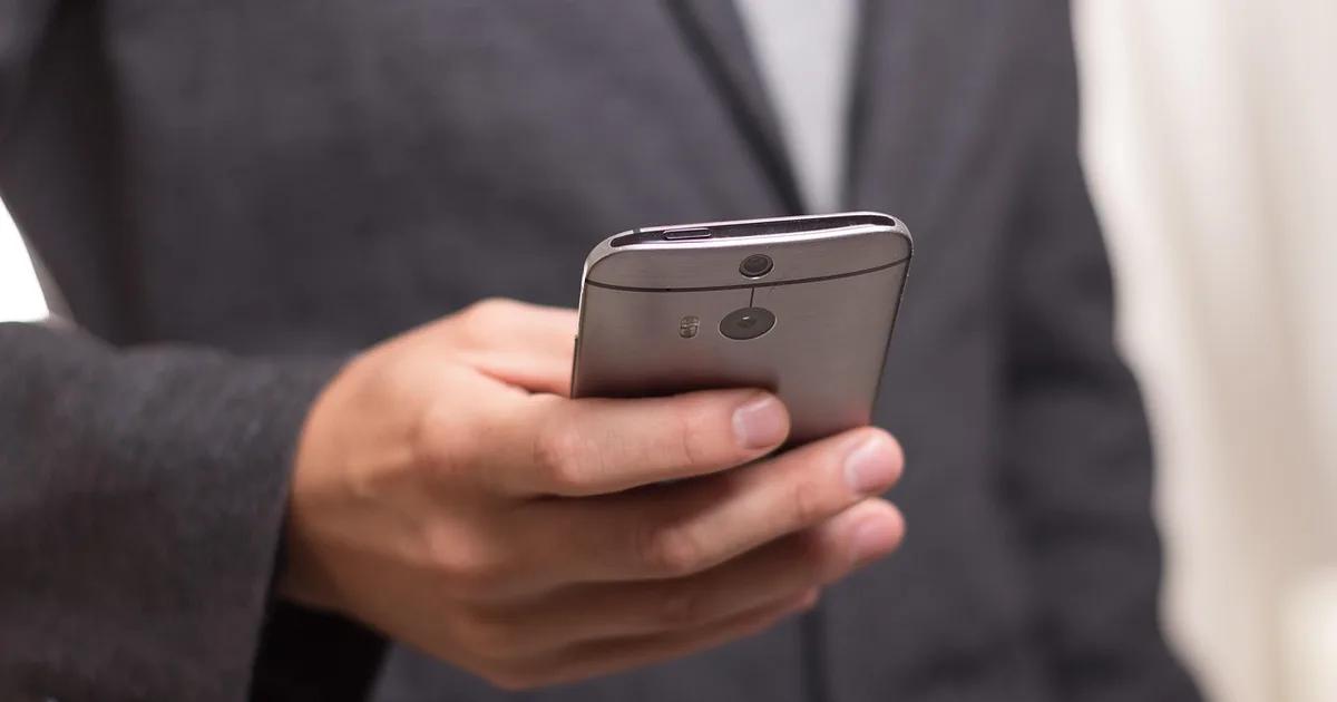 Smartphone screen showing a stack of unwanted text message notifications